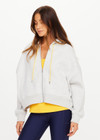 THE UPSIDE women’s grey marle organic cotton Jude Crop Hoodie offers an oversized fit and features a zip through front, hood with drawcord and ribbed cuffs and hem. Made for lifestyle.
