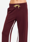 THE UPSIDE women’s maroon recycled Marnie Panelled Wide Leg Pant is high rise and features an elasticated waistband, side seam pockets, contrast detailing and drawcord waist. Made for lifestyle.
