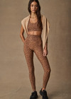 THE UPSIDE women’s leopard recycled peached Javan 28inch High Rise Legging is designed for a soft and supportive fit and features a high rise waist. Made for yoga and pilates.