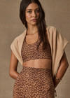 THE UPSIDE women’s leopard recycled peached Javan Jade Sports Bra is designed for a supportive fit and features a full coverage shape, racerback and removable cups. Made for yoga and pilates.