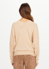 THE UPSIDE women’s sand linen organic cotton Bonita V Neck Knit is designed for a regular fit and features a wide neckline, dropped shoulders and ribbed trims. Made for lifestyle.