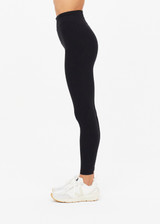 THE UPSIDE women's black Peached 25in Midi Pant is a mid-rise 7/8 length legwear made from recycled soft peached fabric with breathable and moisture-wicking fabrics.