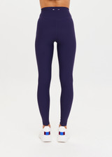 THE UPSIDE Peached 28inch High Rise Pant in Navy is a sustainable 28inch full length legging in our recycled soft peached fabric with a V shaped high-rise waistband.