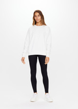 THE UPSIDE women's white Newport Crew is made for a relaxed fit with organic cotton french terry and features ribbed neck, cuffs and waist.