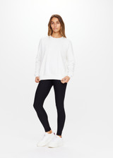 THE UPSIDE women's white Newport Crew is made for a relaxed fit with organic cotton french terry and features ribbed neck, cuffs and waist.