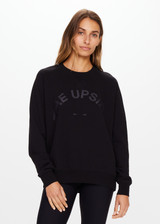 THE UPSIDE women's black Newport Crew is made for a relaxed fit with organic cotton french terry and features ribbed neck, cuffs and waist.