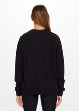 THE UPSIDE women's black Newport Crew is made for a relaxed fit with organic cotton french terry and features ribbed neck, cuffs and waist.