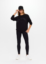 THE UPSIDE women's black Newport Crew is made for a relaxed fit with organic cotton french terry and features ribbed neck, cuffs and waist.