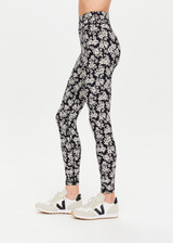 THE UPSIDE Bloom 25inch Midi Pant in Floral is a recycled soft peached mid-rise length legging which is breathable and moisture wicking.