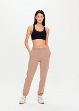 THE UPSIDE Sphinx Blake Track Pant in Mocha is an organic cotton french terry classic fit track pant with pockets and elasticated cuffs.