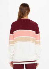 THE UPSIDE Boo Knit in White with Burgundy, Coral and Natural Stripe design is a sustainable organic cotton knit sweater with knitted rib cuffs, hem and neckline.