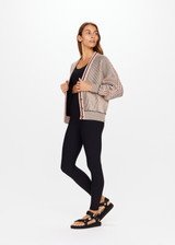 THE UPSIDE Nirvana Jessi Crop Cardigan in Natural is a sustainable organic cotton oversized cropped knitted cardigan with a button front and two tone ribbed knit construction.