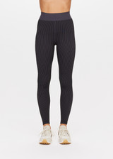 THE UPSIDE Ribbed Seamless 25inch Midi Pant in Black is a mid-rise 25inch midi length legging in a two tone seamless black and charcoal rib fabrication with a contrast knitted waistband.