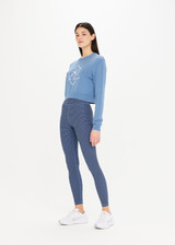 THE UPSIDE The Club Karlie Knit Top in Denim Blue is a sustainable organic cotton knit long sleeve cropped crew with ribbed neckline, hem and cuffs.