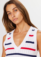 THE UPSIDE Heritage Mina Knit vest is a sustainable organic cotton White cable knit with Red and Navy stripes, ribbed deep V neckline and embroidered arrow at centre back.