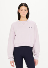THE UPSIDE Akasha Dominique Crew in Orchid Purple is a sustainable organic cotton fleece crew with a high neck band in soft rib and cropped in length.