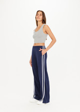 THE UPSIDE Juliet Pant in Navy is a low rise pant with contrast binds, split hem detail, pockets and elasticated waistband.