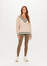 THE UPSIDE Pilot Louie Sweater Pebble Brown is a sustainable organic cotton knit sweater with a deep “V” neckline and knitted stripes through the rib cuffs, neckline and hem.