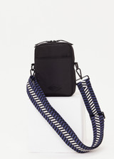 THE UPSIDE black Cosette Crossbody Bag in recycled polyester fabrication features a larger zipper compartment with paracord zip pullers, front slip pocket and an adjustable and removable strap with tri colour design.