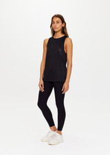 THE UPSIDE Black Quick Dry Sarah Tank is made from a recycled dri release fabrication in black and designed for a relaxed fit and features sweat wicking and quick drying properties.