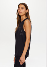 THE UPSIDE Black Quick Dry Sarah Tank is made from a recycled dri release fabrication in black and designed for a relaxed fit and features sweat wicking and quick drying properties.