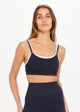 THE UPSIDE womens navy/white double layer Form Seamless Kelsey Bra made with Form Seamless fabric has mid coverage and support, and features moisture control properties.