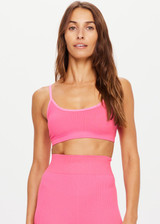 THE UPSIDE womens low-coverage neon pink Ribbed Seamless Ballet Bra made with Ribbed Seamless fabric features elasticated adjustable straps, soft support and moisture control properties.