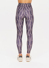 THE UPSIDE womens dark blue abstract pattern mid-rise Mystic Midi Pant made with Recycled Super Soft fabric features feathered arrow print, contrast pink embroidery and drawcord at waist.