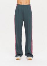 THE UPSIDE womens cool dark blue high waisted wide leg Niseko Monte Pant made with Lenzing viscose soft suiting fabric features elastic waistband, stripe down side seams and side and back pockets.