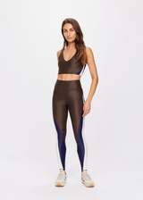 THE UPSIDE women's chocolate-brown Icon 28 Inch High Rise Pant made in Recycled Super Soft Fabric features chocolate, navy and cream colour block panels and a v-shaped waistband. Perfect for yoga, pilates or barre.