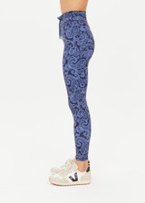 THE UPSIDE women's indigo paisley Nouveaux 25 Inch Midi Pant made in Recycled Soft Peached features a 25 inch leg length, an elasticated drawcord through waistband, arrow logo at centre back, and moisture wicking properties.