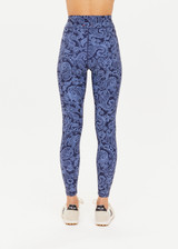 THE UPSIDE women's indigo paisley Nouveaux 25 Inch Midi Pant made in Recycled Soft Peached features a 25 inch leg length, an elasticated drawcord through waistband, arrow logo at centre back, and moisture wicking properties.