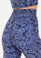 THE UPSIDE women's indigo paisley Nouveaux 25 Inch Midi Pant made in Recycled Soft Peached features a 25 inch leg length, an elasticated drawcord through waistband, arrow logo at centre back, and moisture wicking properties.