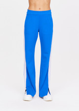 THE UPSIDE women's Blue Bahia Petra Flare is made with recycled tech fleece fabric, for a true to size fit. This flared leisure pant features an elastic waist and side seam pockets.