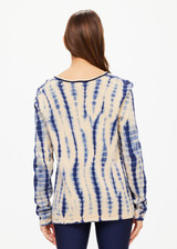 THE UPSIDE women's navy and creme tie dye Wishbone Amana Long Sleeve is made with organic cotton, designed for a relaxed fit. This knitted lifestyle top features a stripy rib neckline.