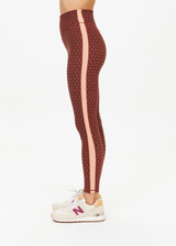 THE UPSIDE women's polka dot Maho 25 inch High Rise Midi Pant is made from a soft recycled ribbed fabric and features a soft folded waistband and contrast splice plan down the sides.