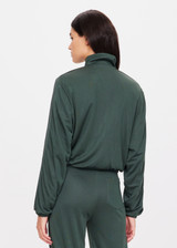 THE UPSIDE women's green Roulette Lopez Jacket is made with slinky fabric and has a cropped fit. This zip-through lifestyle jacket features a high neck and elasticated cuffs and hem.