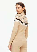 THE UPSIDE women’s khaki Fairbanks Blanche Half Zip is made from organic cotton. The high neck top features knitted fair isle pattern. Designed for Après-ski and winterwear.