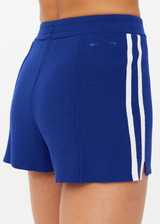 THE UPSIDE women's blue cobalt Carnaby Bisou Knit Short is a knitted mis rise short with white side stripes and an elasticated waistband.