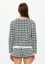 THE UPSIDE women's green Portobello Crochet button down cardigan is made from hand crochet cotton. It features front patch pockets and white pearlised buttons.