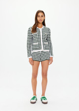 THE UPSIDE women's green Portobello Crochet button down cardigan is made from hand crochet cotton. It features front patch pockets and white pearlised buttons.
