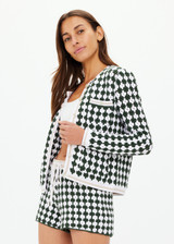THE UPSIDE women's green Portobello Crochet button down cardigan is made from hand crochet cotton. It features front patch pockets and white pearlised buttons.