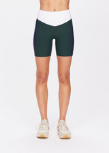 THE UPSIDE women's green Playoff 6inch Pocket Spin Short is made from a recycled soft peached fabrication with a brushed handfeel for a breathable and quick drying effect. The active shorts are paired with colours of navy and white and featuring side pockets for practicality. Designed for golf.