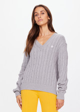 THE UPSIDE women's grey Seymour Cable Knit Sweater is made from organic cotton. Featuring a V shape neckline and ribbed cuffs, hem and neckline for comfort and style. Designed for leisure and recovery.