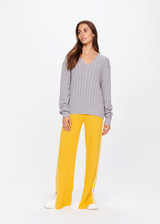 THE UPSIDE women's grey Seymour Cable Knit Sweater is made from organic cotton. Featuring a V shape neckline and ribbed cuffs, hem and neckline for comfort and style. Designed for leisure and recovery.