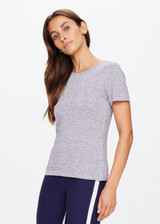 THE UPSIDE women's striped Pacey Stripe Tee is made from a hemp and organic cotton blend. The fitted baby style tee is designed with a contrast yellow arrow on the back for an elevated effect. Designed for light movement and recovery.
