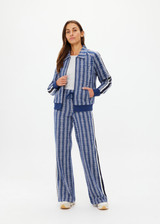 THE UPSIDE women's blue striped Joie Pari Zip Jacket is a jacquard zip through sports jacket, featuring knitted navy and cream stripe tape down sleeves for style and welt pockets and ribbed hem and cuffs for comfort. Designed for leisure and recovery.
