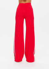 THE UPSIDE women's red Montana Freya Knit Pant is made from viscose blend. The straight pants features elastic waist and side stripe. Designed for lifestyle wear.