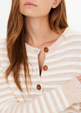 THE UPSIDE women's natural Canyon Isabeli Knit Cardigan is made from organic cotton. The buttoned up cardigan features ribbed hem, cuff and neck. Designed for lifestyle wear.