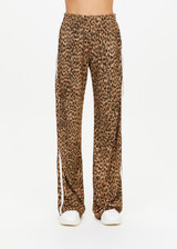 THE UPSIDE women's leopard Panthera Jetset Pant is made from viscose and rayon. The side stripe pants features pockets. Designed for travel and lounge.